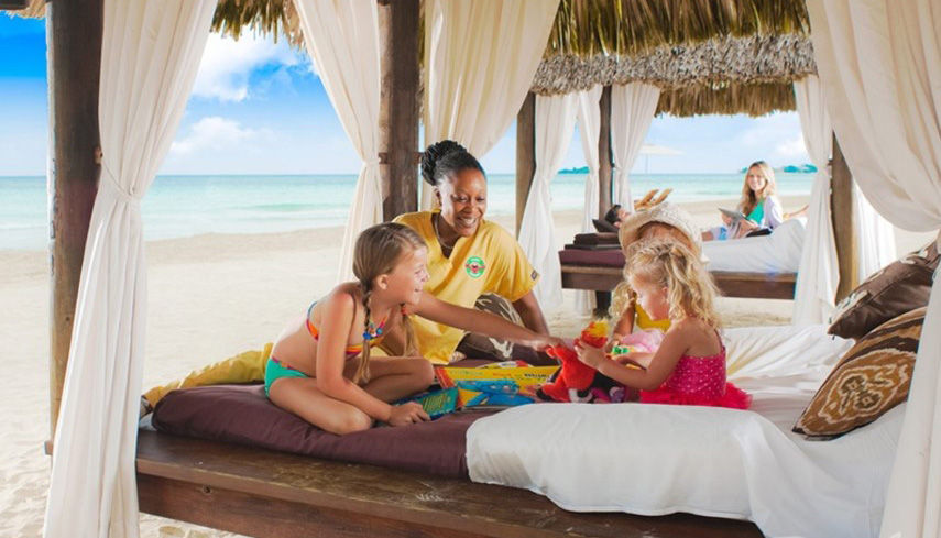 Family enjoying the beach at Beaches Negril Resort & Spa