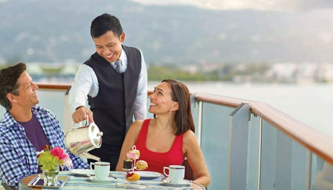 Couple dining on board luxury world voyage