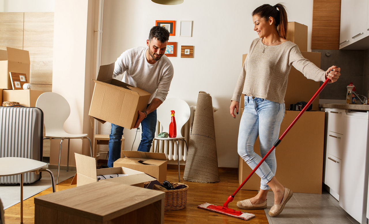 couple preparing to move, cleaning as they go