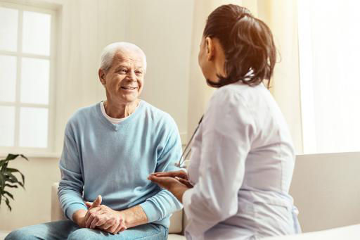 Elderly Couple Reviewing Medicare Documents