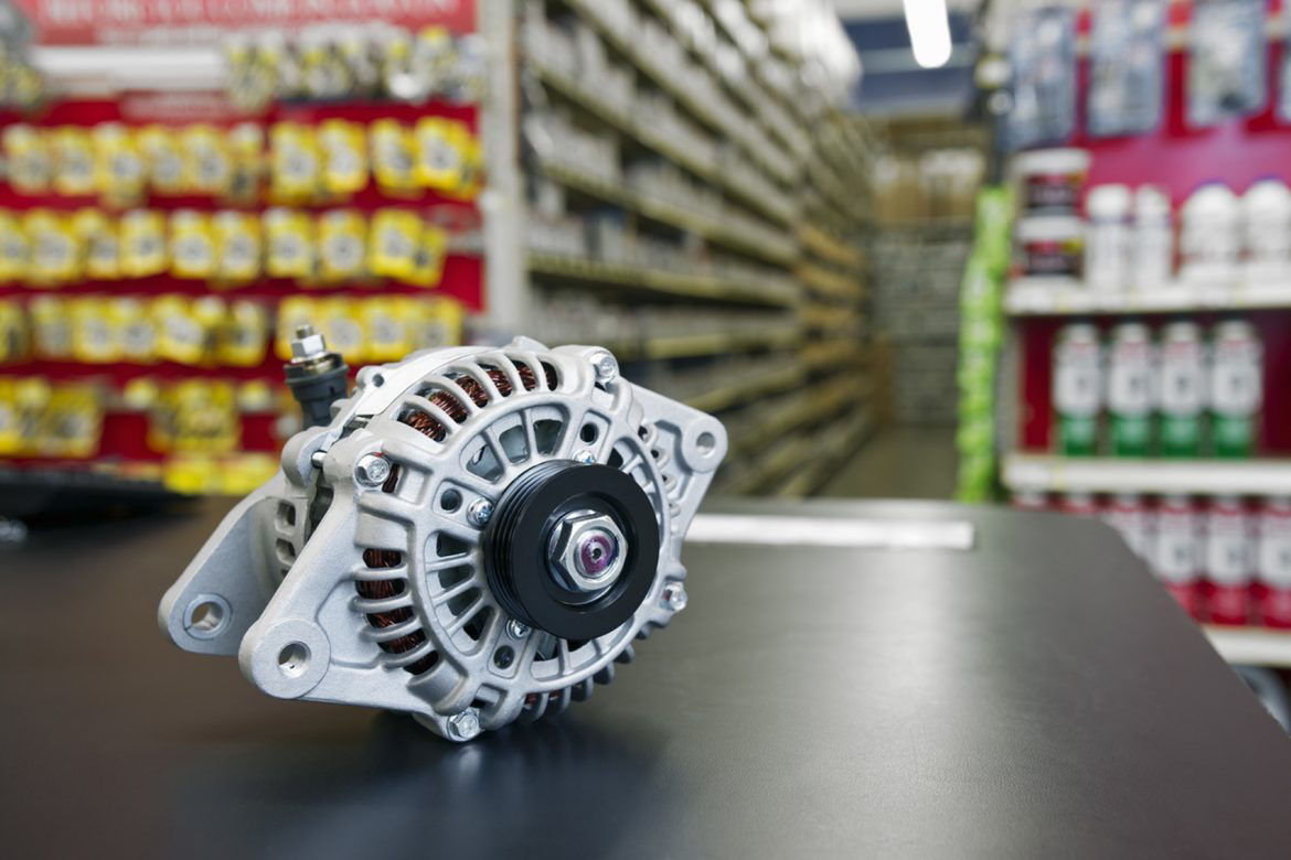 image of an alternator on a table in a auto parts store