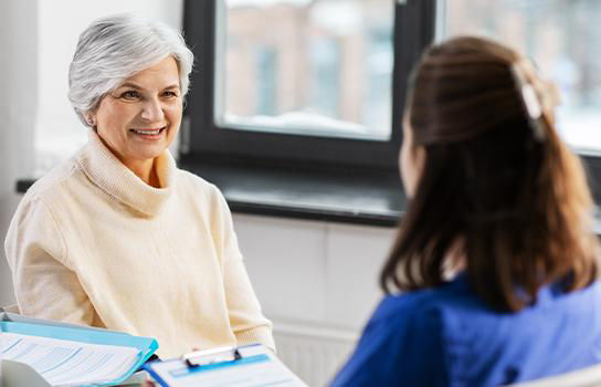 Woman receiving information on Medicare 