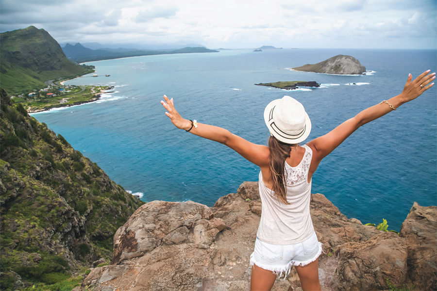 Traveler overlooking a bay