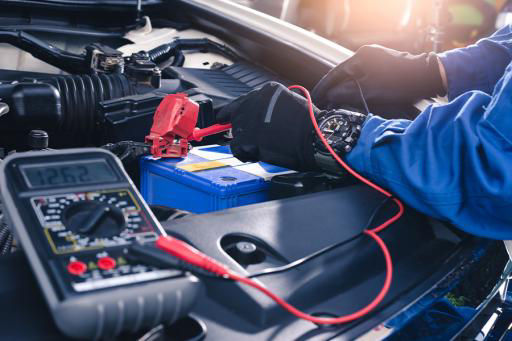 Person checking car battery