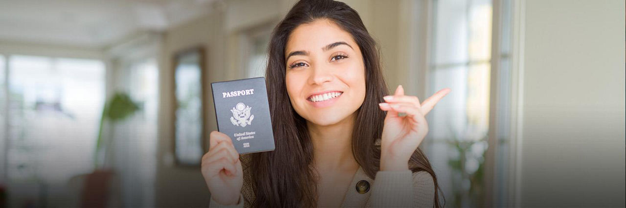 Woman holding a United States Passport
