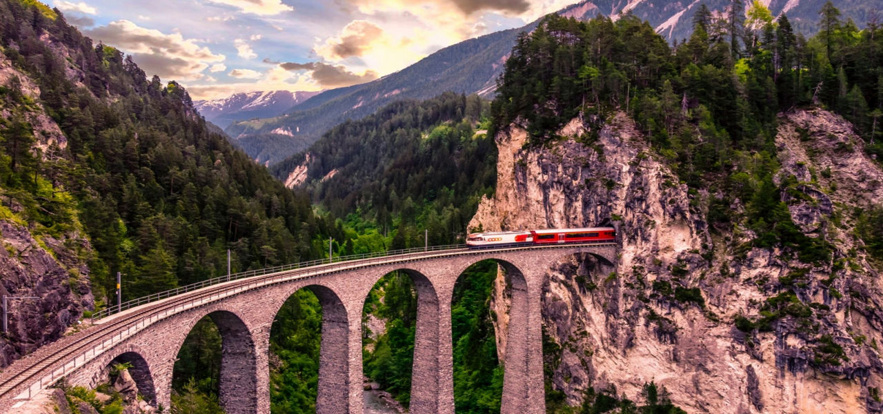 train crossing a bridge in Europe