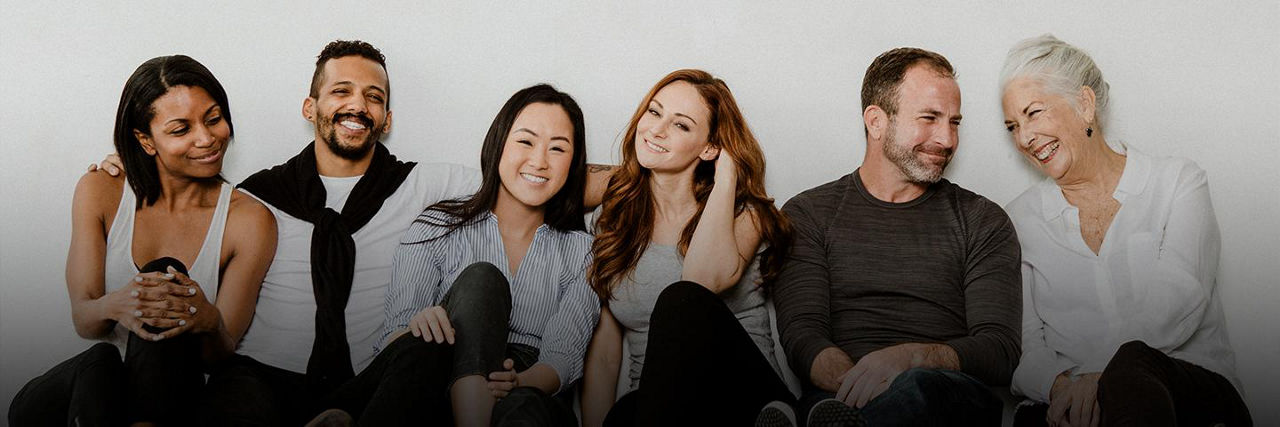 Group of six people laughing, Healthcare for Businesses 