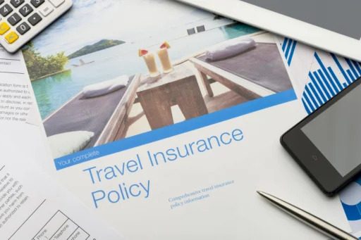 Paperwork showing travel insurance policy