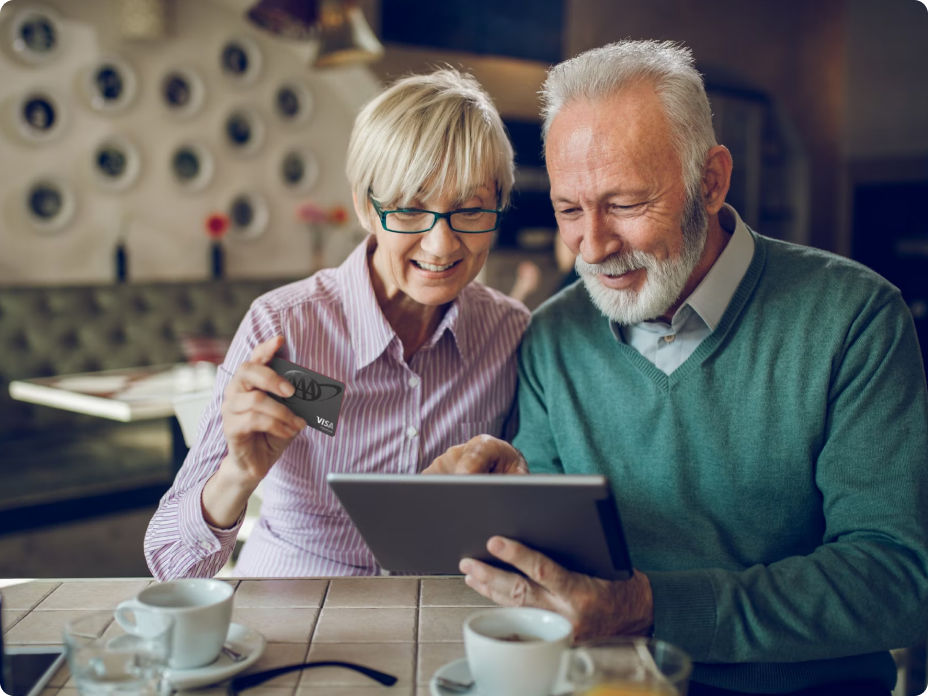Senior couple researching services.