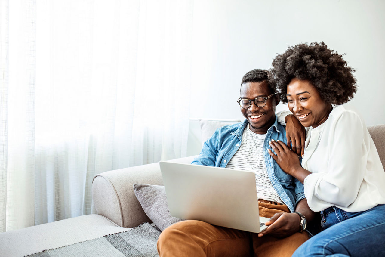 couple looking at laptop