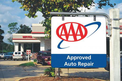 AAA Approved Auto Repair sign in front of a shop