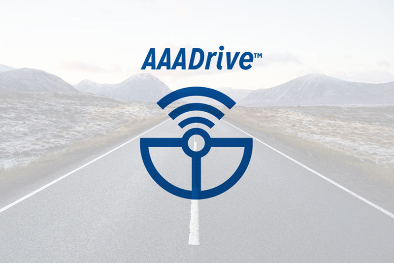 AAADrive logo overlayed on image of open road. 