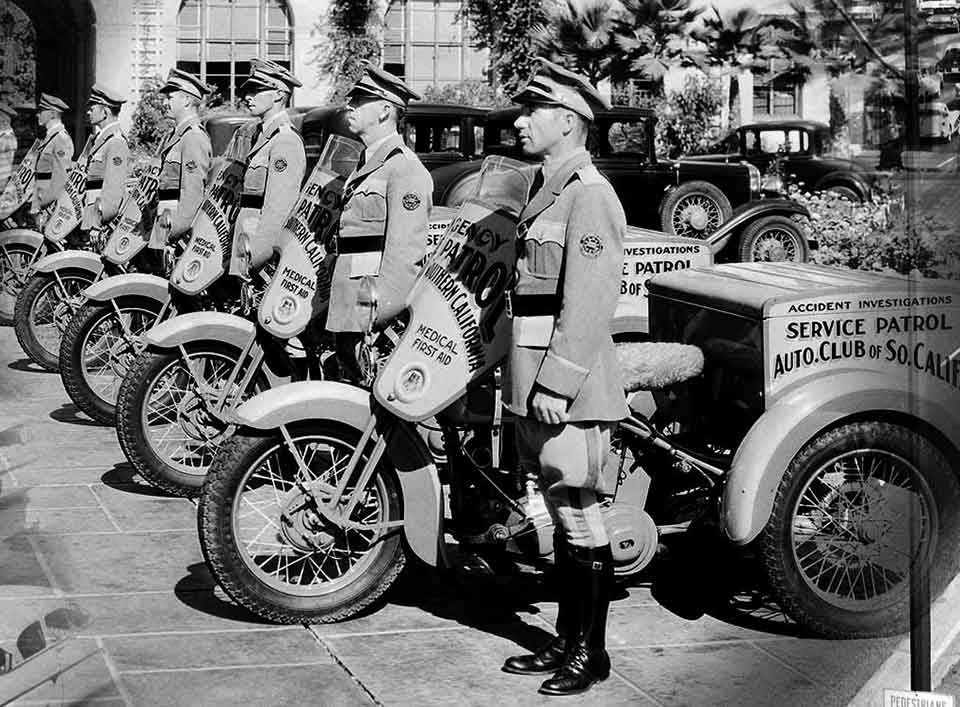 aaa service patrol men in the 1900s lined up side by side