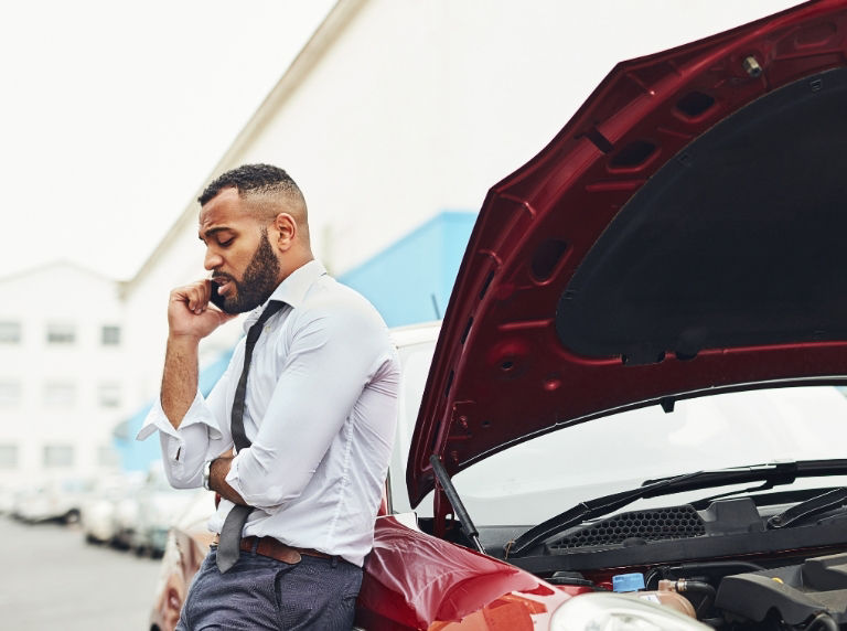 man on phone after car accident