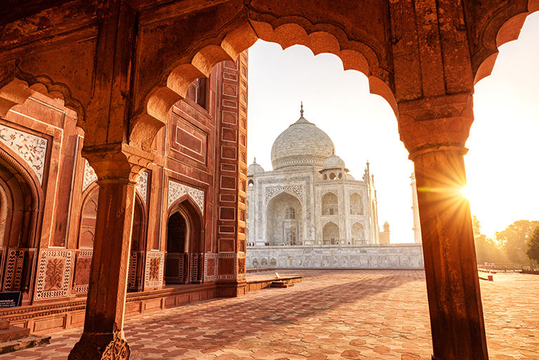 The magnificent Taj Mahal in India shows its full splendor at a glorious sunrise.