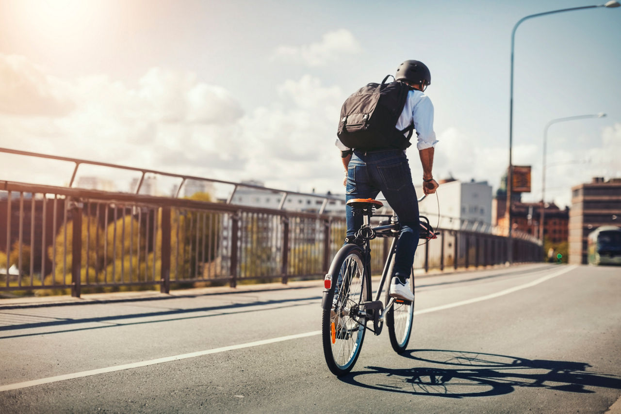 Man commuting by bicycle.