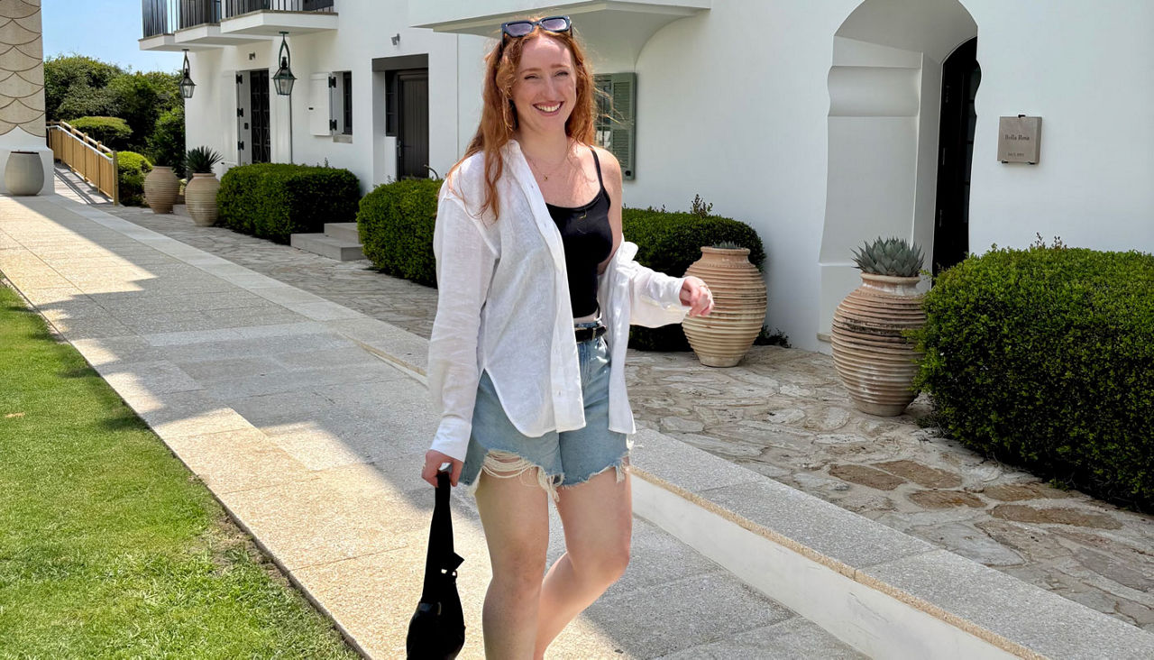 Jessica Cunningham walking outdoors during shoot of the summer I turned to AAA