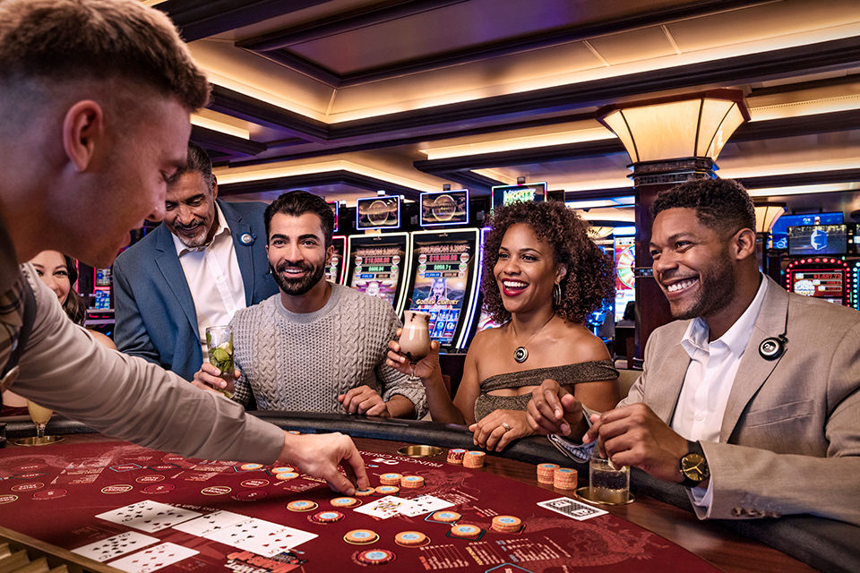 Couples and friends having fun at the casino on their Princess cruise vacations.