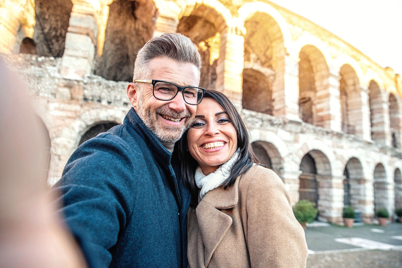 Married couple of tourists taking a selfie in Rome, Italy 