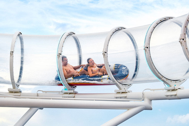 Couple riding the Aqua Mouse Water ride on Disney cruise ship