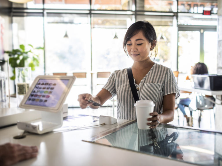 Girl paying with credit card