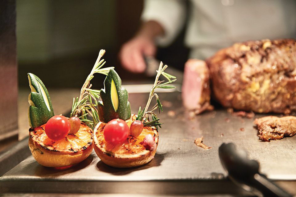Fine dining and meat carving station aboard Royal Princess cruise.
