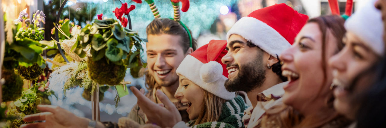 Travelers at a Christmas Market in Germany