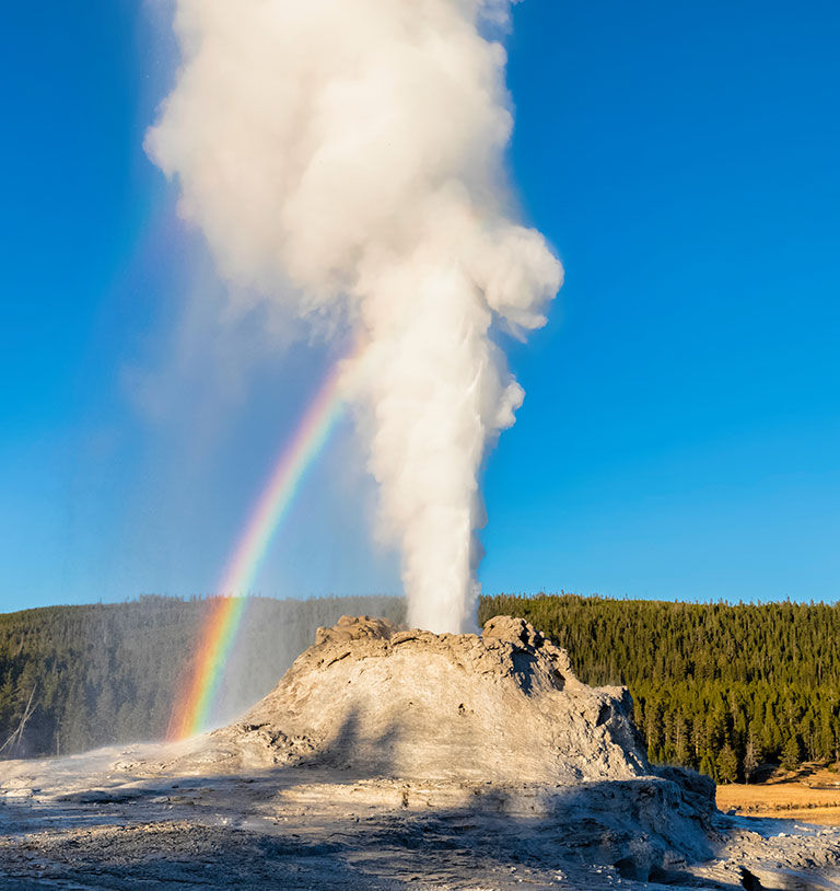 USA, Wyoming, Yellowstone National Park, Upper Geyser Basin, Castle Geyser erupting.
