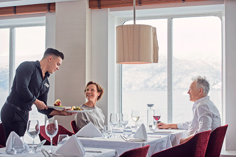 Hurtigruten signature voyages dinning experience with AAA benefits.