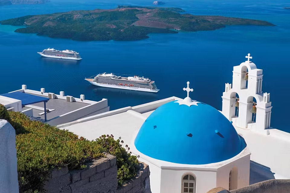 Aerial view of two Viking ships anchored near Santorini, Greece