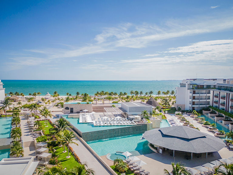 A stunning pool view of the resort at Majestic Elegance Costa Mujeres