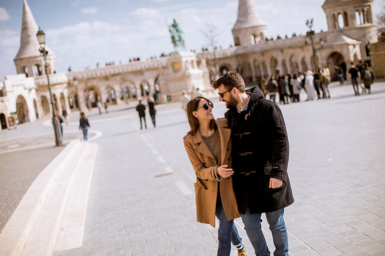 Loving couple by the Fisherman's Bastion in Budapest, Hungary.