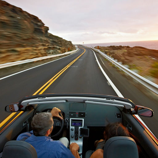 couple in car on the open road
