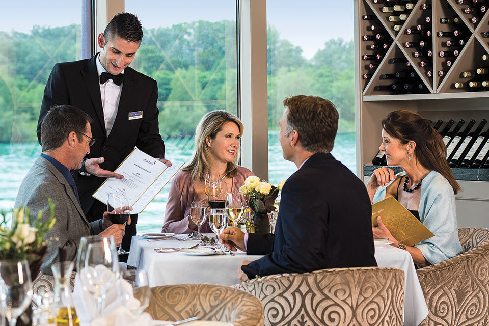 Friends enjoying a wine tasting activity during their cruise