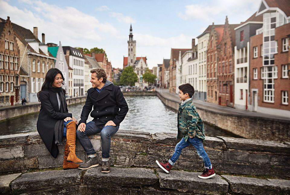 Family having fun on excursion in Bruges, Belgium with Princess Cruises.