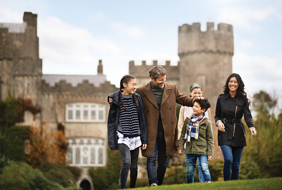 Dublin, Ireland. Happy family on a walk, near a castle on Princess Cruises excursion.