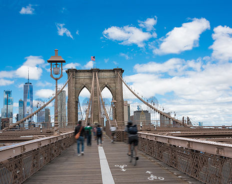 Walking the Brooklyn Bridge in New York.