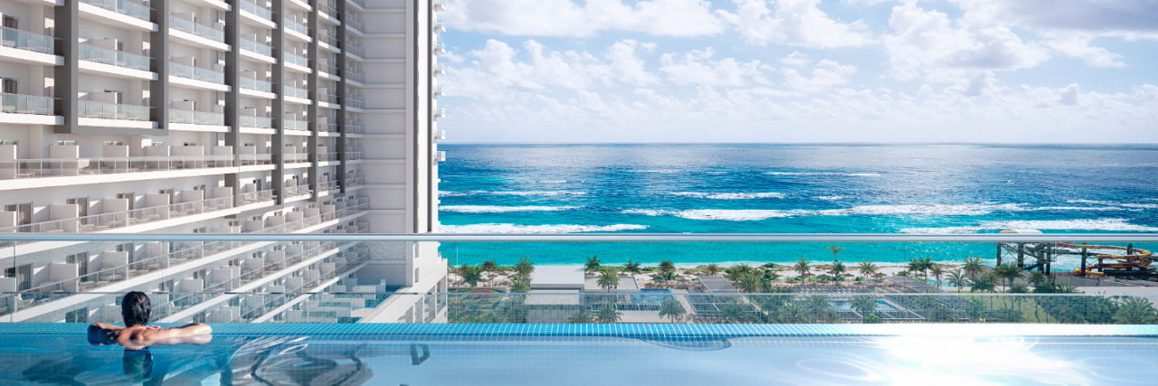Man in private pool at Hotel Riu Ventura