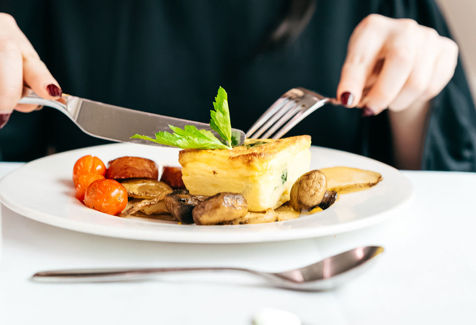 Norwegian Cruise Line freestyle dining dinner plate with fish and vegetables