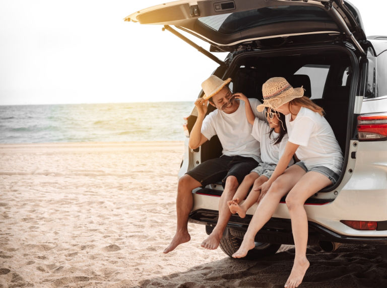 Family on the beach having fun