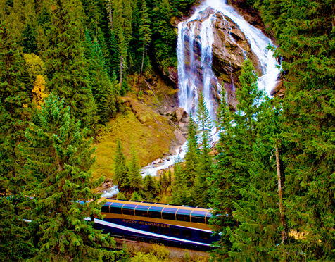 train going by a waterfall