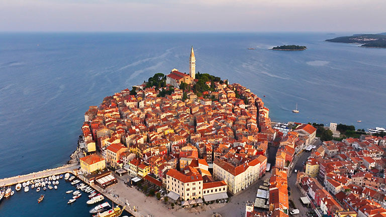 Rovinj Old Town peninsula, aerial view at sunrise, Church of Sai.