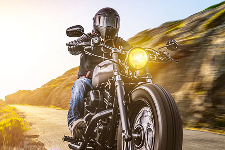 Motorcycle rider. Spring season.