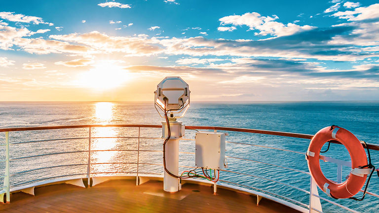 Ship deck at sunrise.