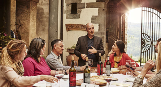 People enjoying a wine tasting.