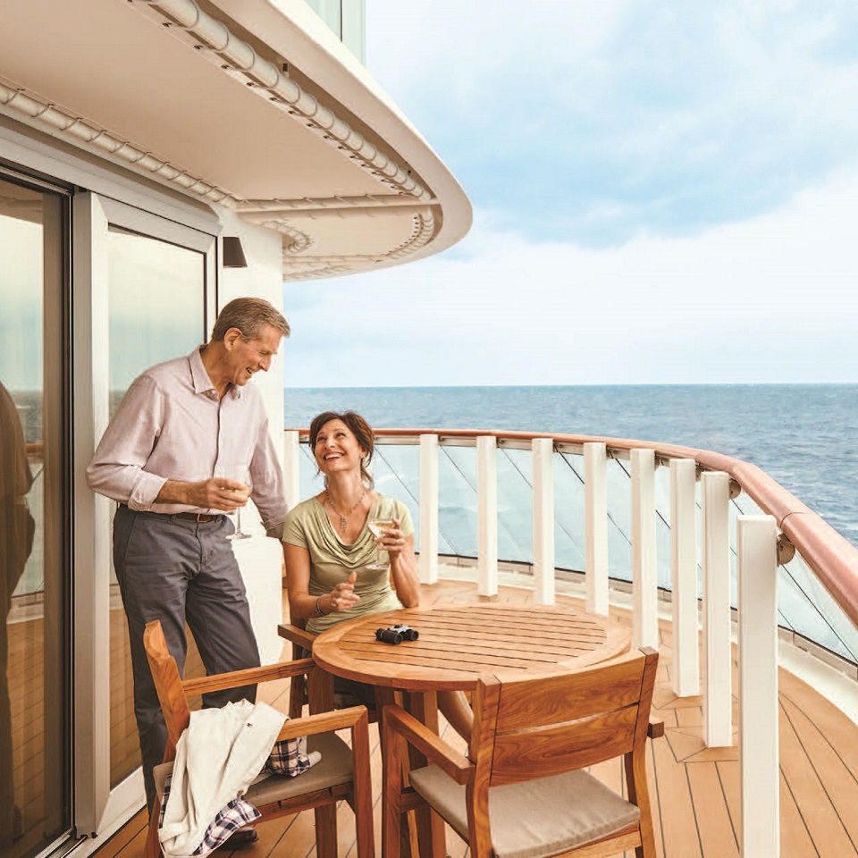 Viking Ocean cruise. Couple on stateroom balcony.