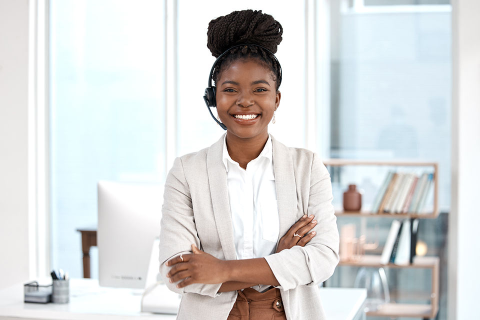 Smiling and confident travel agent. 