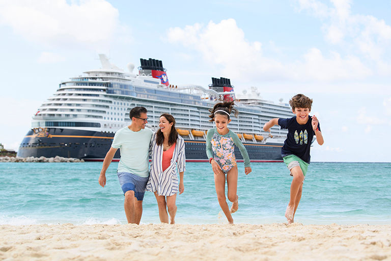 Happy family having fun on a Disney Cruise vacation.